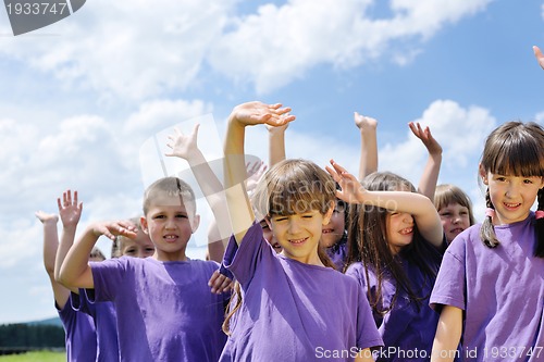 Image of happy kids group  have fun in nature