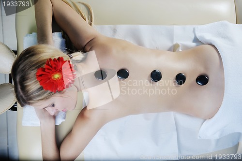 Image of Beautiful young woman in spa