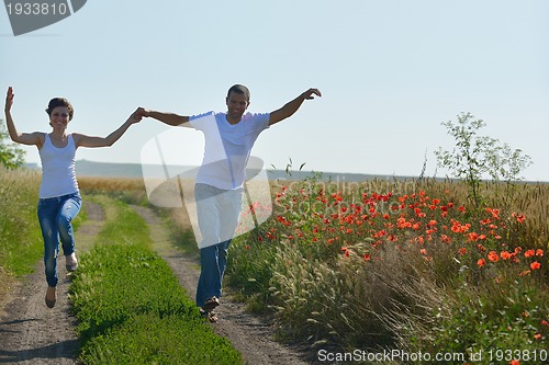 Image of happy couple in wheat field