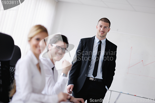 Image of business people in a meeting at office