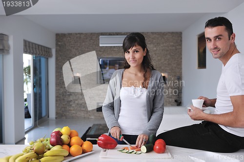 Image of young couple have fun in modern kitchen