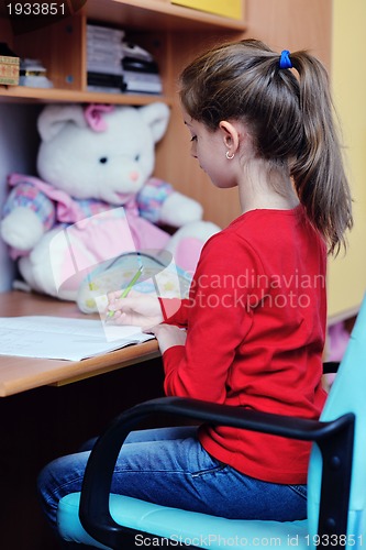 Image of girl doing homework