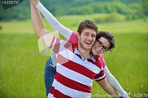Image of romantic young couple in love together outdoor