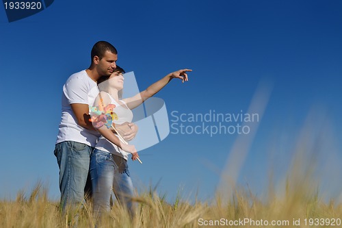 Image of happy couple in wheat field