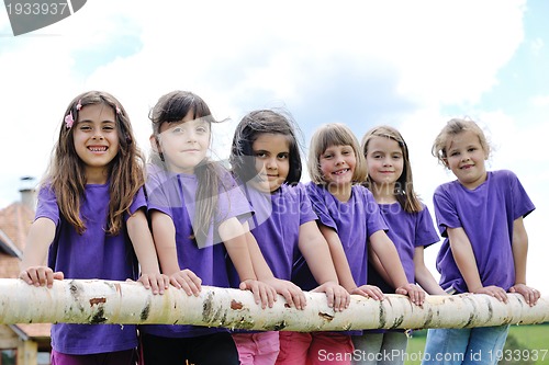 Image of happy kids group  have fun in nature