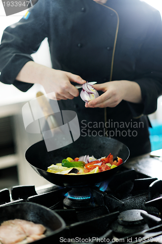 Image of chef preparing meal