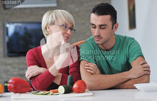 Image of young couple have fun in modern kitchen