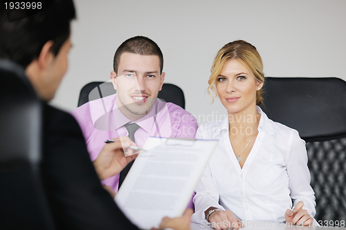 Image of Group of young business people at meeting