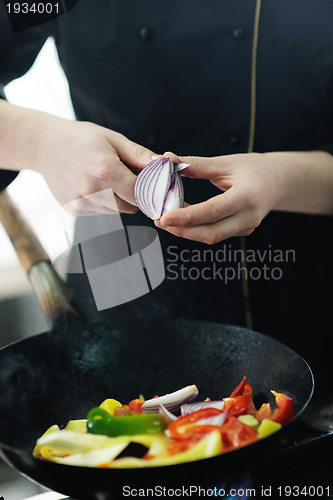Image of chef preparing meal