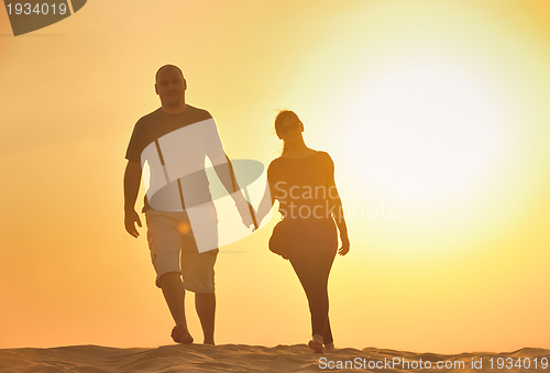 Image of couple enjoying the sunset