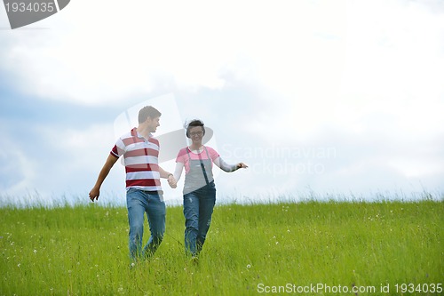 Image of romantic young couple in love together outdoor