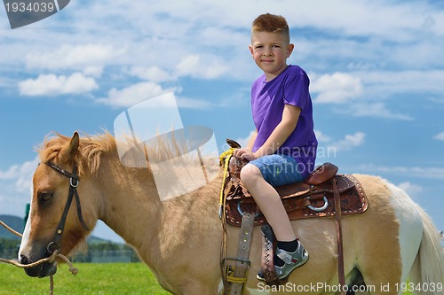 Image of child ride pony