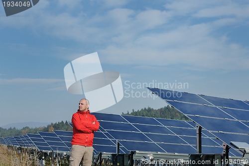 Image of Male solar panel engineer at work place