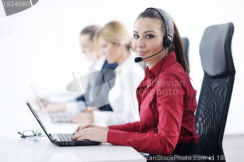 Image of business woman group with headphones