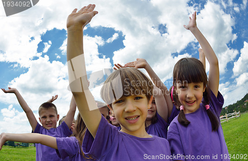 Image of happy kids group  have fun in nature