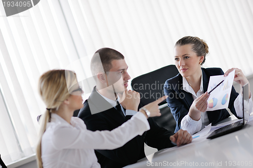 Image of business people in a meeting at office