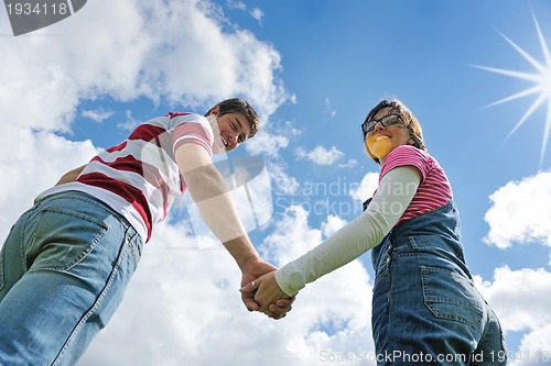 Image of romantic young couple in love together outdoor