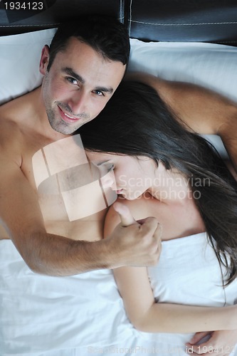 Image of young couple have good time in their bedroom