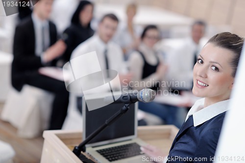 Image of business woman giving presentation