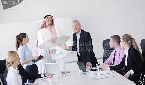 Image of Arabic business man at meeting
