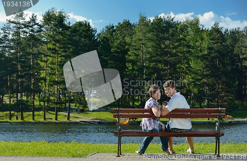 Image of romantic young couple in love together outdoor