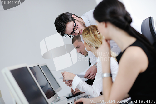 Image of business people group working in customer and help desk office