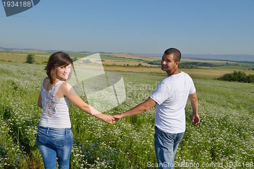 Image of happy couple in wheat field