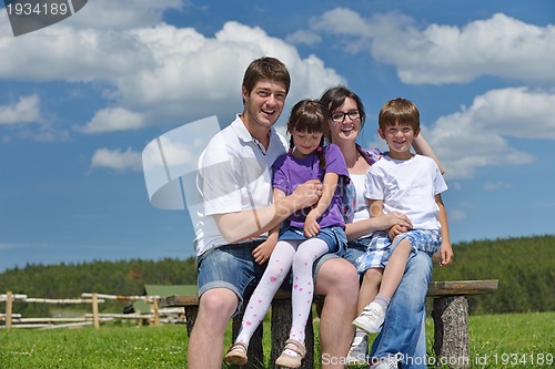 Image of happy young family have fun outdoors