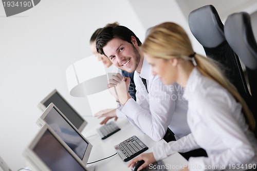 Image of business people group working in customer and help desk office