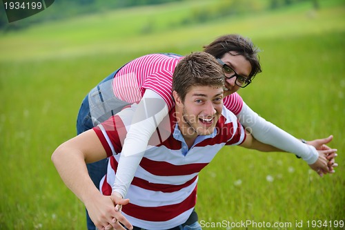 Image of romantic young couple in love together outdoor