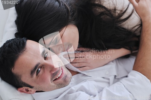 Image of happy young couple relax at home
