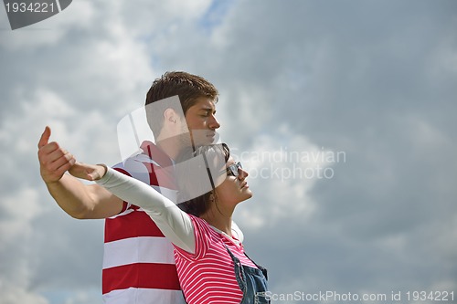 Image of romantic young couple in love together outdoor