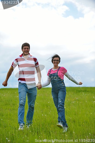 Image of romantic young couple in love together outdoor