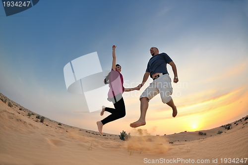Image of couple enjoying the sunset