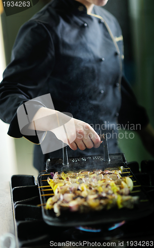 Image of chef preparing meal