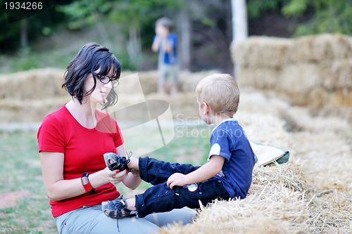 Image of woman and child have fun outdoor