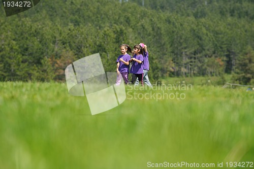Image of happy kids group  have fun in nature