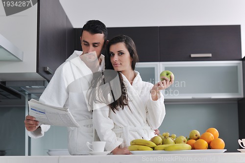 Image of young couple have fun in modern kitchen