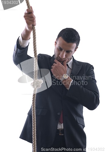 Image of business man with rope isolated on white background