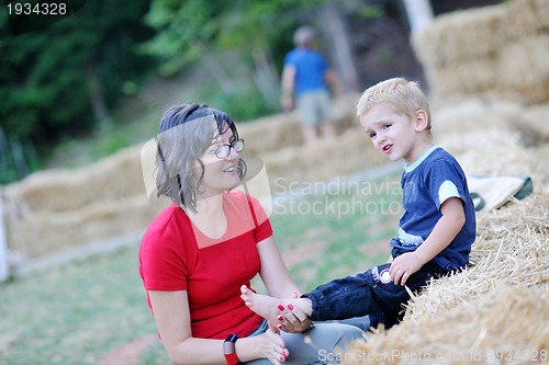 Image of woman and child have fun outdoor