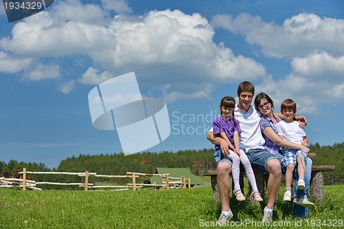 Image of happy young family have fun outdoors