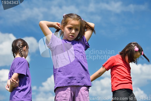 Image of happy kids group  have fun in nature