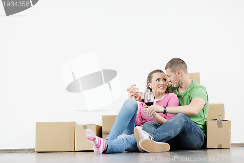 Image of Young couple moving in new house