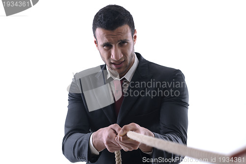 Image of business man with rope isolated on white background