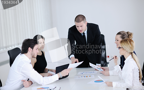 Image of business people in a meeting at office