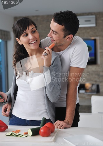 Image of young couple have fun in modern kitchen