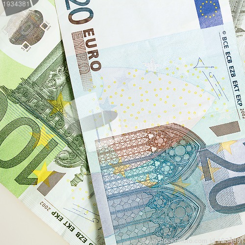 Image of Euro banknotes arranged in background