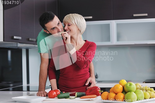Image of young couple have fun in modern kitchen