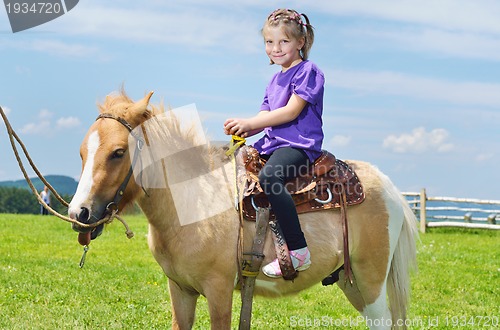 Image of child ride pony