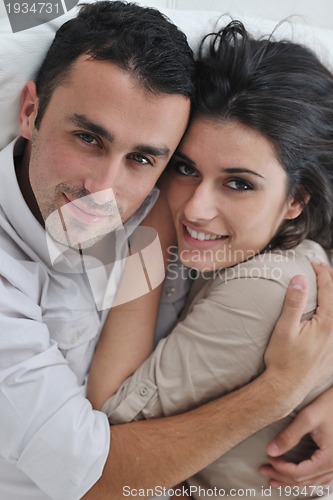 Image of happy young couple relax at home